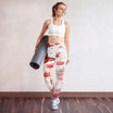 Woman standing in yoga leggings with butterflies design